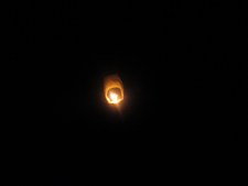 pic of balloon rising into night sky